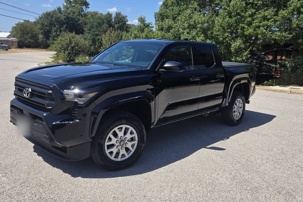 Remigio’s new black Toyota Tacoma, seen from the front